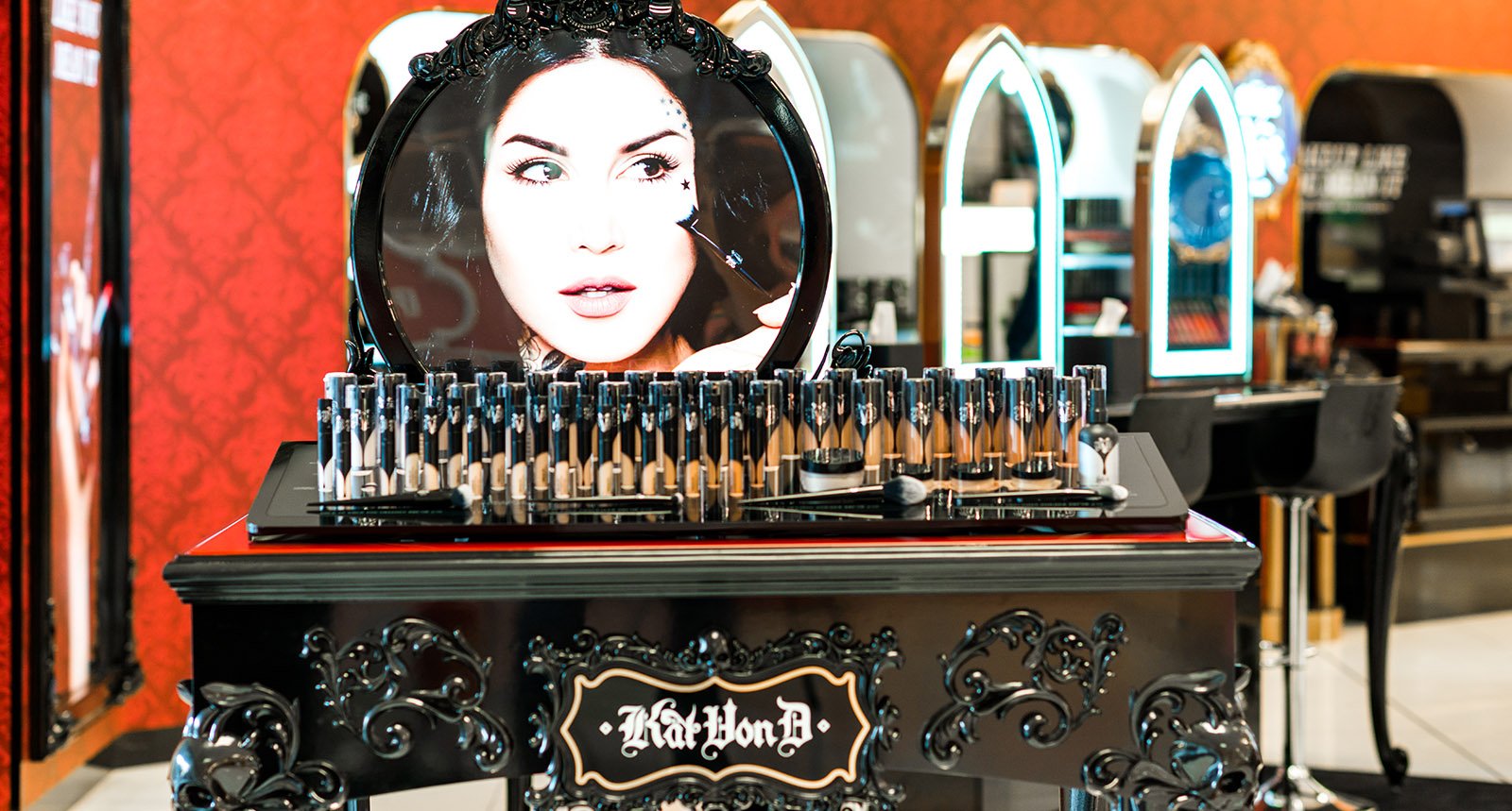 Makeup table with photo of Kat von D