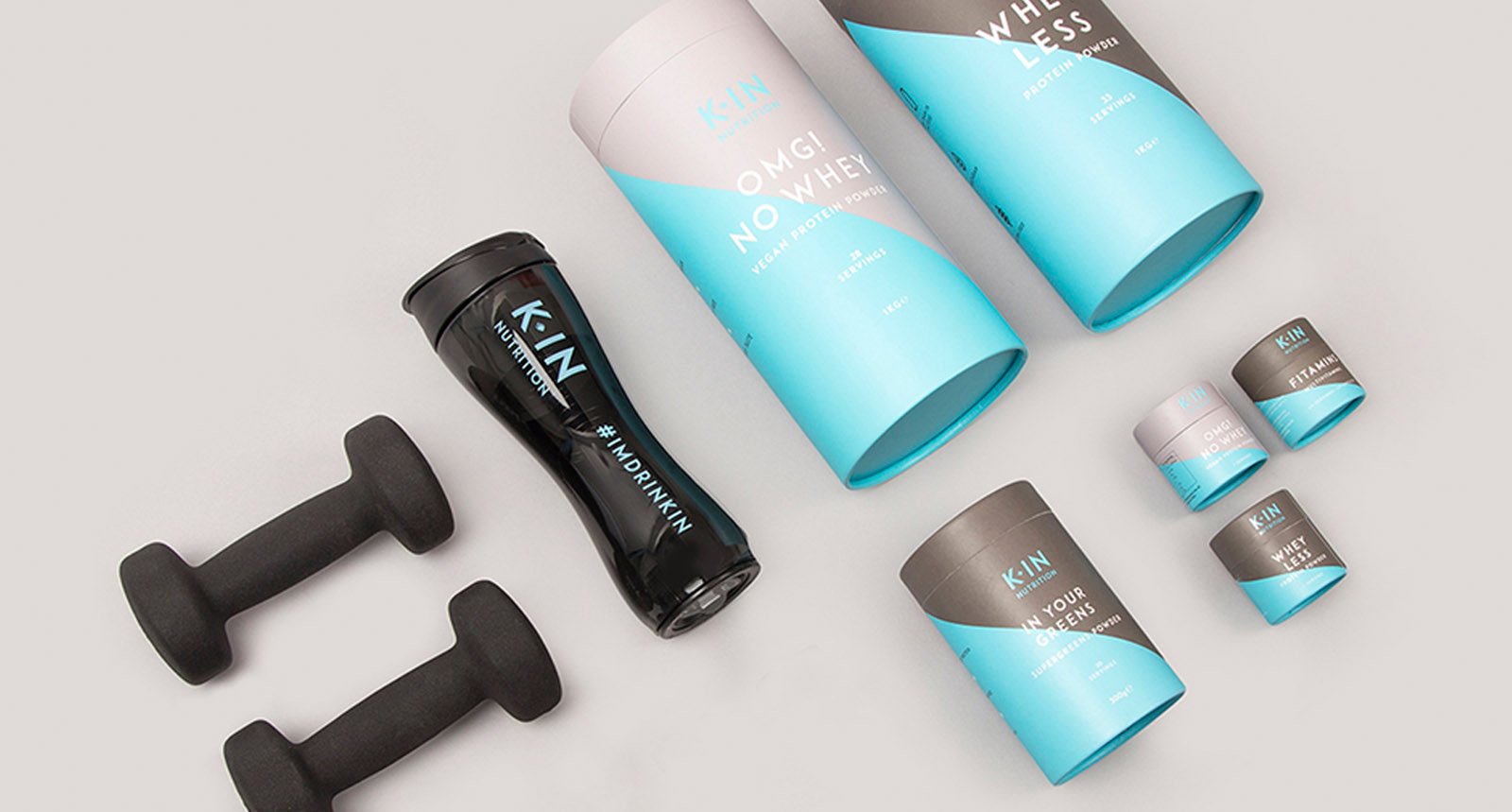 KIN End Result, Whey Packaging, Dumbbells and Protein Bottle