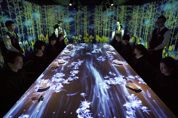 Japanese art collective teamLab has produced an immersive experiences that responds to the movements of diners’
