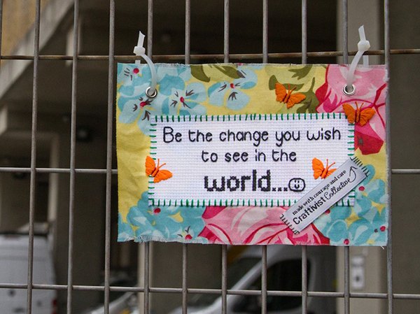 Banner stating: Be the change you wish to see in the world