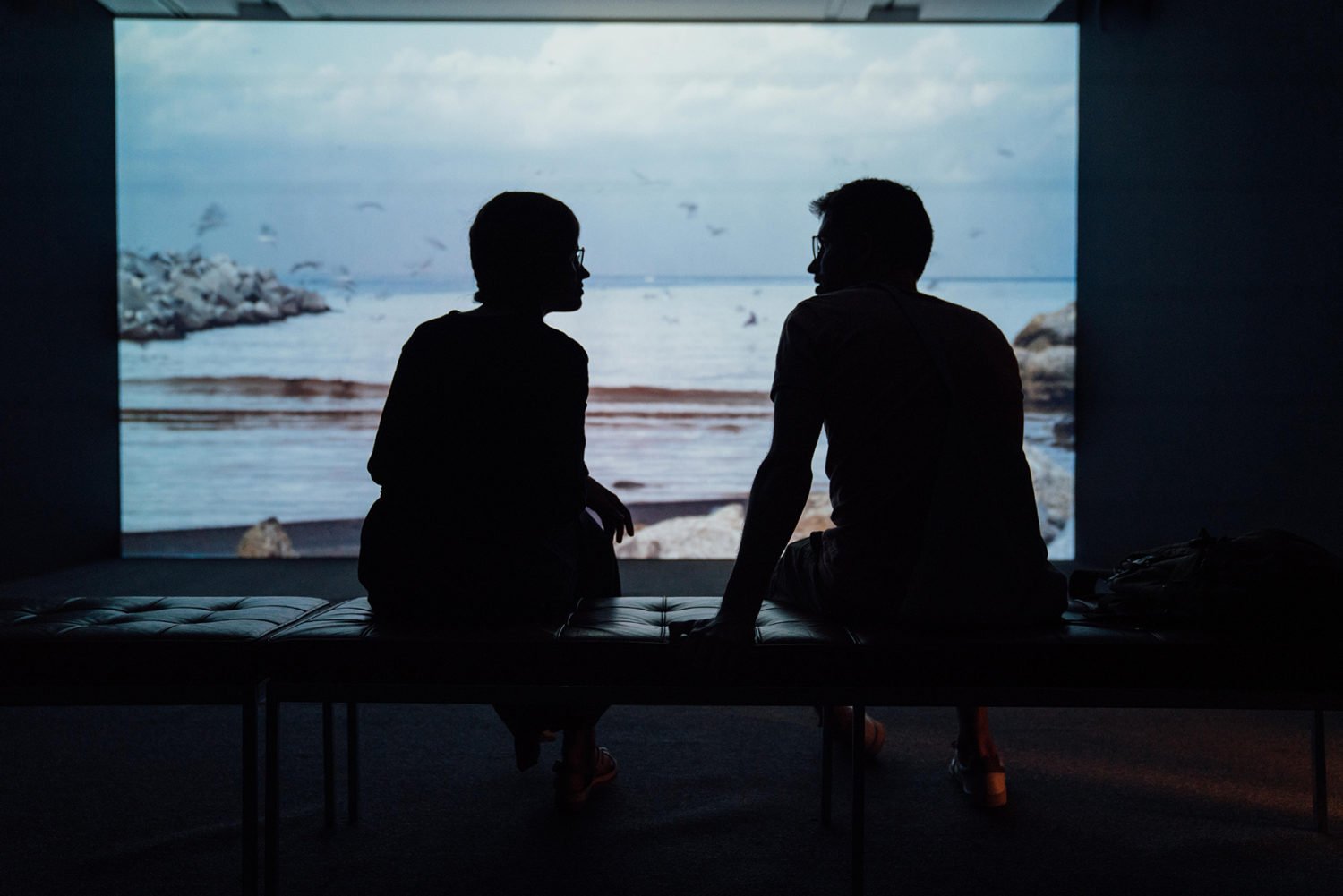 man and woman conversing
