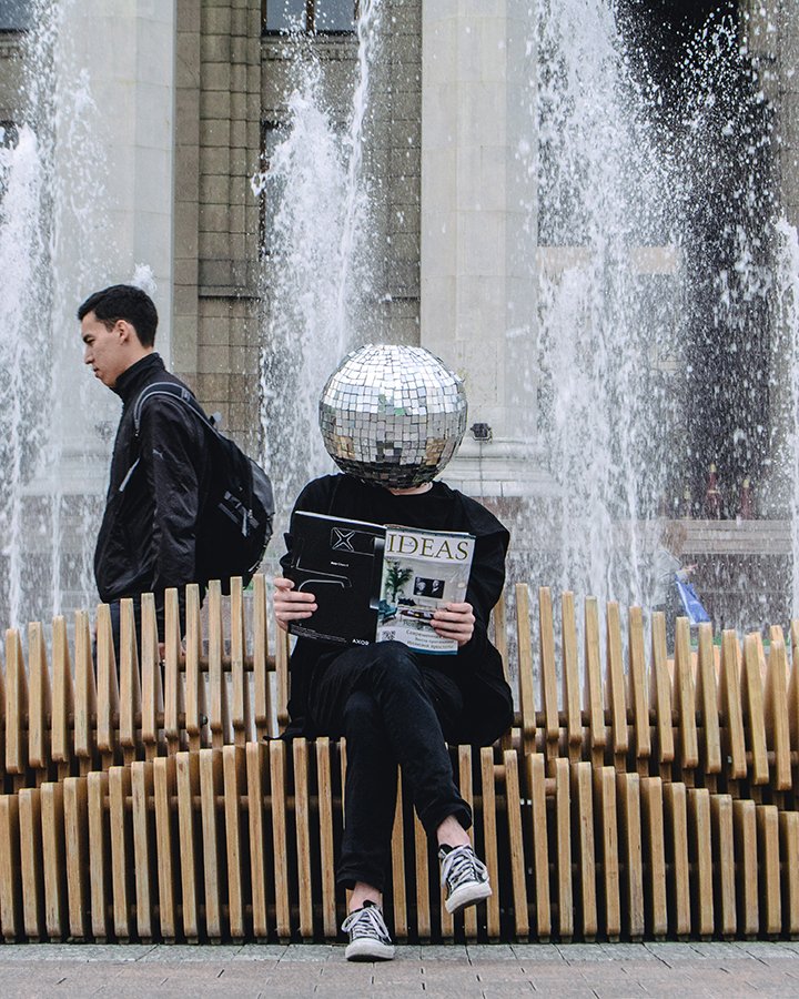 woman with discoball head