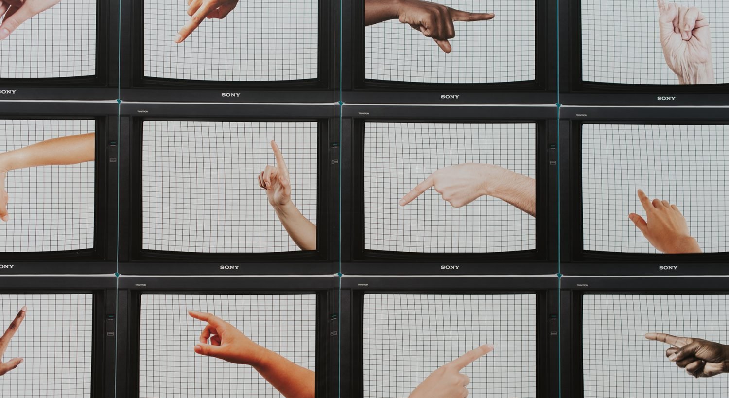 fingers on a tv screen